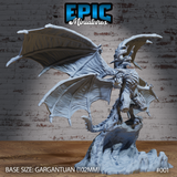 Emperor Dragon by Epic Miniatures: a gargantuan winged dragon rearing upright on a sculpted rocky base, wings spread wide, horned head snarling, heavy overlapping scales covering the muscular body and long tail.
