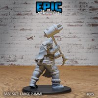 Hill Giant Juggernaut by Epic Miniatures — rear view showing layered fur-trimmed armour, heavy leather strapping, and furred boots, maul raised high above the helmeted head.