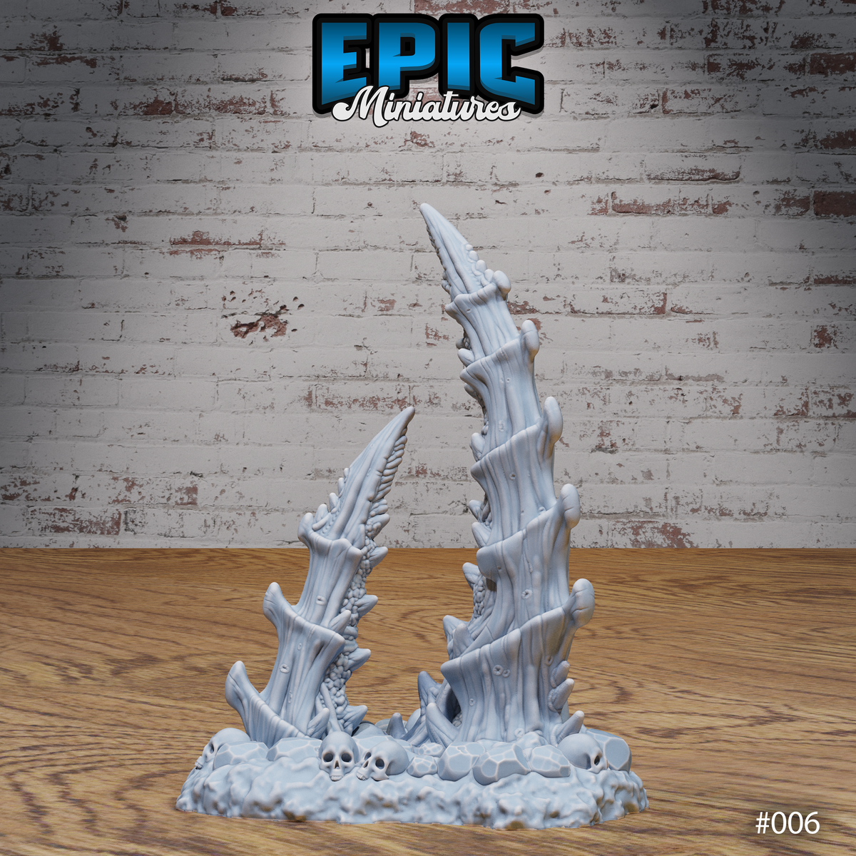Two bone spike terrain pieces assembled together on a shared skull-strewn rubble base — one taller upright spire and one smaller leaning spike — showing the multipart arrangement. Sculpt by Epic Miniatures.