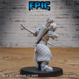 Hunter miniature viewed from behind, showing a heavily stocked arrow quiver with individually sculpted fletched arrows, quilted diamond-pattern armour across the back, a cloak over one shoulder, and a short blade tucked at the hip. Sculpt by Epic Miniatures.