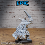 Cat-folk warrior seen from behind with sword thrust high, a heavy billowing cloak falling to the knees over belted layered armour, fur-textured shoulders and pointed ears visible above the collar. Sculpt by Epic Miniatures.