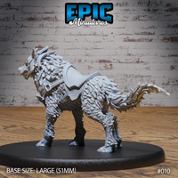 War wolf with mouth agape in a growl, saddle and armour straps visible across the back, a spined and clawed tail swept dynamically to the rear, dense shaggy fur sculpted in overlapping layers, on a large oval base. Sculpt by Epic Miniatures.