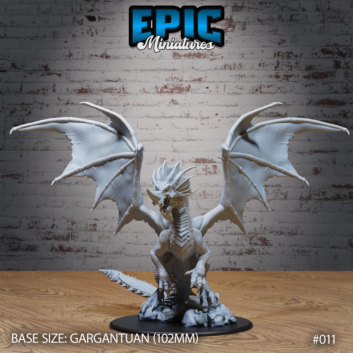 Ancient Blue Dragon rearing upright with both wings fully spread wide, head thrust forward with parted jaws and cranial spines, raised foreclaws gripping a rocky sculpted base. Sculpt by Epic Miniatures.