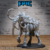 Skeletal elephant with exposed ribcage, armoured back-plates, spiked chain-wrapped trunk raised with a hooked claw tip, and anklet spikes on all four legs. Sculpt by Epic Miniatures.