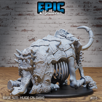Rear view of armoured elephant skeleton miniature showing woven-plate barding, exposed ribcage, rope-bound legs, spiked armour panels, and curving tail with a cuffed tip. By Epic Miniatures.