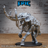 Skeletal elephant miniature in a charging pose, tusks wrapped in barbed chains, exposed ribcage, cracked skull, spiked armour plates across back and shoulders, huge 76.5mm base. By Epic Miniatures.