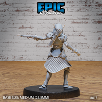 Dark elf female soldier seen from behind, revealing chainmail skirt panels, buckled back plate, and studded pauldrons, crossbow arm extended outward mid-aim. Sculpt by Epic Miniatures.