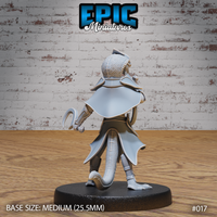 Lizardfolk warrior seen from behind, showing a broad armoured cape across the shoulders, segmented tail scales, clawed feet, and the sickle arm raised slightly to the side. Sculpt by Epic Miniatures.