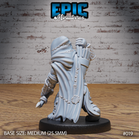 Canine humanoid archer seen from behind, deep hood pulled up, stitched patchwork cloak falling to the knees with knotted hem embroidery, crossbow bolts in a quiver at the back. Sculpt by Epic Miniatures.