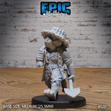 Stocky canine humanoid farmer facing forward, holding a hand axe at his side and a coil of rope over one shoulder, wearing a thick woven straw hat, shaggy fur coat, and patched trousers. Sculpt by Epic Miniatures.
