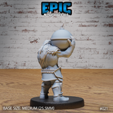 Dwarf miniature seen from behind hoisting a fused cannonball overhead, showing braided hair, bone or trophy necklace across the back, armoured belt with knotwork detail, and broad powerful stance. Sculpt by Epic Miniatures.