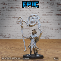 Lizardfolk mage in articulated plate armour, thrusting a staff forward with one claw while the other hand raises aloft a vast swirling arcane vortex. Mouth open in a hiss. Sculpt by Epic Miniatures.