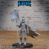 Armoured skeleton standing upright, holding a tall skull-topped war banner in one hand and a short orb sceptre in the other, wearing a crested helm, layered plate armour with skull motifs, and a billowing cape. Sculpt by Epic Miniatures.