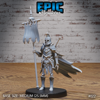 Armoured skeleton standing upright, holding a tall skull-topped war banner in one hand and a short orb sceptre in the other, wearing a crested helm, layered plate armour with skull motifs, and a billowing cape. Sculpt by Epic Miniatures.