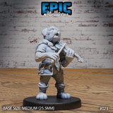 Stout dogfolk bard playing a fiddle, mouth open mid-song, wearing a stitched cape, fur-trimmed sleeves, and belted trousers with laced detailing. Sculpt by Epic Miniatures.