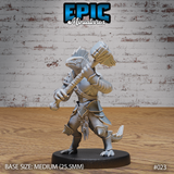 Lizardfolk warrior in scaled armour and dorsal crest, raising a cord-wrapped hammer overhead with both hands, clawed feet planted wide. Sculpt by Epic Miniatures.