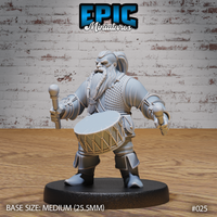 Stocky dwarf miniature with a long braided beard, wearing scale mail armour, holding a marching drum at his waist with one drumstick raised and one hand gripping the other stick. Sculpt by Epic Miniatures.