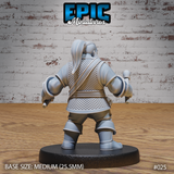 Dwarf miniature viewed from behind, showing a topknot hairstyle, detailed scale mail covering the back and torso, layered clothing, and armoured boots. Sculpt by Epic Miniatures.