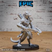 Lizardfolk soldier in articulated plate armour holding a crossbow extended forward, tail sweeping low, large cylindrical quiver on back. Sculpt by Epic Miniatures.