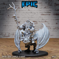 Muscular orc shaman mounted on a snarling winged bat, raising a tall skull-decorated bone staff with antler tips, wearing layered armour and bone adornments, on a 51mm base. Sculpt by Epic Miniatures.