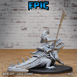 Lizardfolk warrior in segmented plate armour mounted on a giant iguana, viewed from behind and to the side. Serrated spear raised high, mount's spiked tail and clawed rear feet clearly visible. Sculpt by Epic Miniatures.