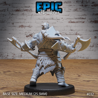 Orc barbarian seen from behind, both axes raised outward, hair in a topknot, broad back crossed with leather straps. Fur-trimmed lower body and cord-wrapped lower legs visible. Sculpt by Epic Miniatures.