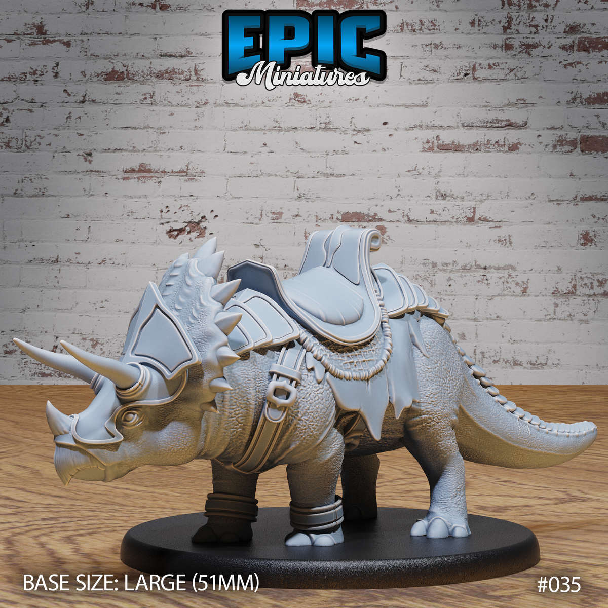 Armoured triceratops miniature viewed from the front-left, showing three prominent horns, spiked frill barding, full riding saddle with rolled pack, rope detailing, and ankle wraps. Sculpt by Epic Miniatures.
