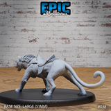 Armoured panther miniature viewed from the left side, body low and extended in a stalking pose, segmented spinal armour and saddle clearly visible, curled tail raised behind. Sculpt by Epic Miniatures.