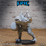Frogfolk bard miniature crouching with a knotted club raised overhead and a round stitched shield on his forearm, wide grinning mouth, padded cloth armour with ankle guards. Sculpt by Epic Miniatures.