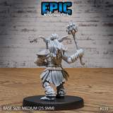 Goblin warrior seen from behind, long hair flowing down between two curved horns, mace raised in one hand. Rope-wrapped waist belt and layered back armour visible in detail. Sculpt by Epic Miniatures.