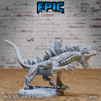 Crystal Drake miniature by Epic Miniatures — large quadrupedal reptilian predator lunging forward with jaws open, spine covered in dramatic angular crystal formations, on a rocky 51mm base.
