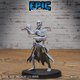 Skeleton miniature in tattered robes, one hand raised mid-gesture and the other holding an open tome at waist height, exposed ribs visible beneath layered cloth, ragged hem. Sculpt by Epic Miniatures.