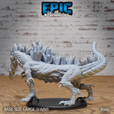 Crystal Drake Flame by Epic Miniatures viewed from above and behind, showing the full ridge of large faceted crystal formations running the length of the spine, with dense overlapping scales across the broad back and haunches.
