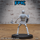 Skeleton warrior seen from behind, breastplate straps and scale-mail skirt visible, battle axe held at the side, round shield raised in the left hand, bare bony legs and feet. Epic Miniatures.