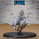 Dark elf rider in articulated plate armour seated on a rearing panther, gripping a broad crescent-bladed weapon. The panther wears fitted barding and raises its forelimbs mid-charge. Sculpt by Epic Miniatures.