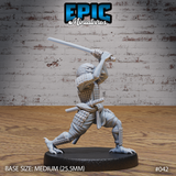 Kenku samurai miniature raising a katana overhead in a low combat stance, wearing layered lamellar armour with a second blade at the hip, clawed feet and bird head visible. By Epic Miniatures.