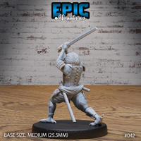 Kenku samurai miniature seen from behind, lace-backed armour and shoulder plates detailed, katana raised overhead in both hands, clawed feet spread wide in a grounded fighting stance. By Epic Miniatures.