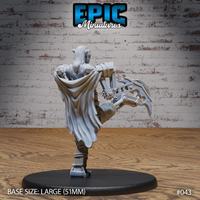 Rear view of a goblin mech suit miniature showing a flowing cloak billowing behind mechanical arms fitted with crescent blades, gear housings and rope-wrapped joints. Sculpt by Epic Miniatures.