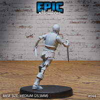 Skeleton warrior seen from behind mid-stride, one knee raised, daggers gripped in both bony hands, chainmail skirt and worn plate armour visible across the back and legs. Sculpt by Epic Miniatures.