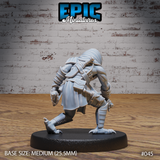 Kenku rogue miniature viewed from behind and to the side, showing a draped hood falling across the back, layered leather pauldrons with buckled straps, a belted sash, and clawed feet splayed on a plain round base. Sculpt by Epic Miniatures.