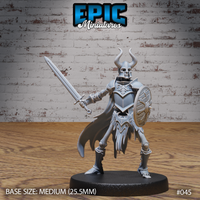 Armoured skeleton warrior standing in a guard stance, holding a longsword raised across its body and a round shield on the opposite arm, wearing an engraved breastplate, horned helm, and a flowing tattered cape. Sculpt by Epic Miniatures.