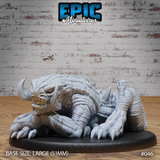 A large horned cave crawler miniature crouching low, wide clawed forelimbs spread, rows of dorsal spines along its back, snarling fanged maw facing forward. Sculpt by Epic Miniatures.