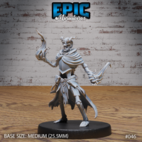 Horned skeletal sorcerer in tattered robes, one hand raised with flame-like energy curling from the fingers, skull face snarling, belted waist with hanging pouches. Sculpt by Epic Miniatures.