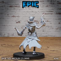 Skeletal sorcerer seen from behind, both arms raised with energy tendrils extending from clawed hands, billowing robes torn at the hem, small horns visible atop the skull. Sculpt by Epic Miniatures.