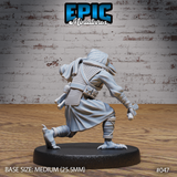 Kenku miniature seen from behind showing heavy cloak folds, chainmail back, utility belt with pouch, and raised taloned foot mid-stride. Sculpt by Epic Miniatures.