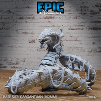 Thorn Wyrm by Epic Miniatures: a gargantuan serpentine beast with neck raised and jaws wide open, coiled body covered in layered scales and dorsal spines, on a 102mm round base.