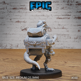 Lizardfolk miniature seen from behind, showing a heavily detailed mechanical backpack with riveted panels, cylindrical canisters and layered pouches, scaled tail visible below. Sculpt by Epic Miniatures.