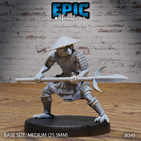 Kenku warrior in a low braced stance, gripping a long glaive horizontally at waist height. Wears lamellar shoulder armour, belted robes, riveted greaves, and a wide conical hat. Clawed feet splayed wide. Sculpt by Epic Miniatures.