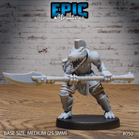 Armoured alligator folk warrior in a wide combat stance, gripping a long rope-wrapped poleaxe held horizontally at chest height, jaws open wide, wearing riveted plate shoulder guards and greaves. Sculpt by Epic Miniatures.
