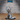 Tall robed figure with a vast branching antler crown, extending one open hand while dragging an ornate skull-tipped scythe along the ground. Heavy layered armour beneath flowing robes. Sculpt by Epic Miniatures.